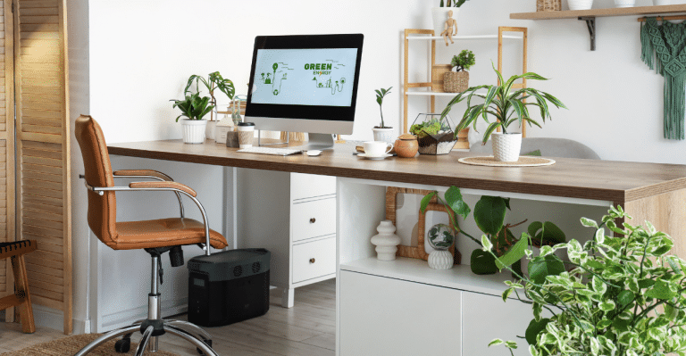 Modern healthy workspace with natural light and greenery supporting employee well-being and productivity